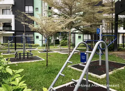 an empty playground in a park with trees at Manhattan Condo Ipoh Waterpark PoolView FREE Carpark & Netflix by PLY Home in Ipoh
