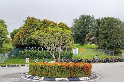 a group of motorcycles parked in a parking lot at Botani Tmn Cyber Ipoh(24 pax /tv box/mahjong) in Ipoh