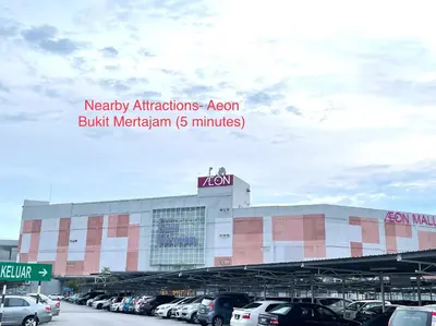 a building with cars parked in a parking lot at Cozy288#4pax#wifi#NearAeonAlma,Mcd#2kmtoIconicPoint in Bukit Mertajam