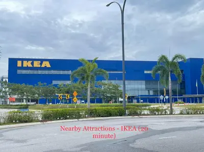 a kera building with palm trees in front of a street at Cozy288#4pax#wifi#NearAeonAlma,Mcd#2kmtoIconicPoint in Bukit Mertajam