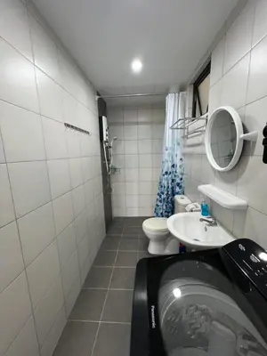 a small bathroom with a sink and a toilet at The Sun 1 or 3BR Bayan Lepas 4 to 10 pax WL in Bayan Lepas