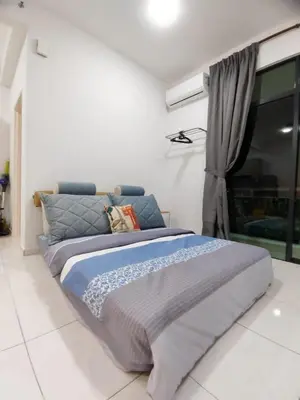 a large bed in a room with a window at The Sun 1 or 3BR Bayan Lepas 4 to 10 pax WL in Bayan Lepas