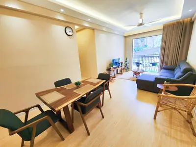 a living room with a table and chairs and a couch at The Cove Ipoh Garden East, Taman Ipoh Permai, Garden East, 31400 IPOH in Ipoh