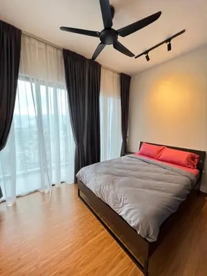 a bedroom with a bed with a ceiling fan at Beacon Executive Suites #CozyFamilyStay #RoofTopPool #13 in George Town
