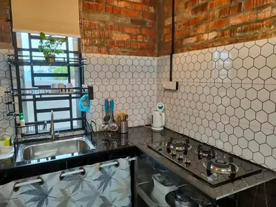 a kitchen with a sink and a counter top at Studio Amani 1 Permatang Pauh in Permatang Pauh