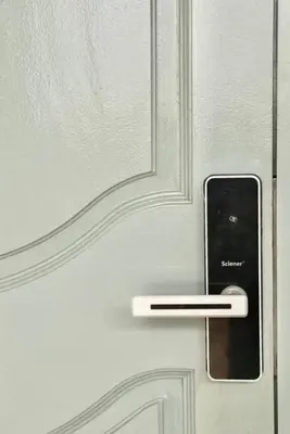 a door with a handle on a white door at Ipoh Tambun Lost World Le Greens in Ipoh