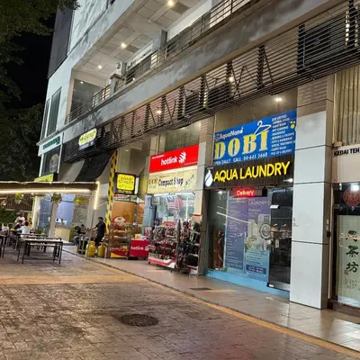 a store front of a building at night at 4 PAX ONE BEDROOM SOHO near USM SPICE ARENA AIRPORT MUTIARA SPECIALIST in Bayan Lepas