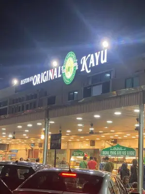 a kya store with cars parked outside at night at 4PAX near USM n Pantai Hospital n PISA SPI CE ARENA in Bayan Lepas