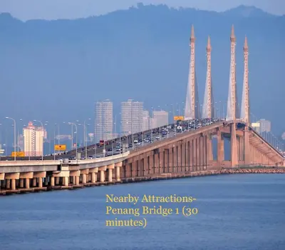a bridge over the water with cars on it at Cozy24#4pax#wifi&netflix#NearAeonAlma#Heritage in Bukit Mertajam