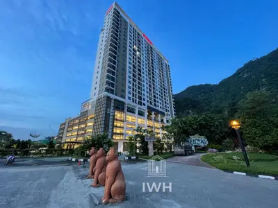 a tall building with naked men in front of it at Ipoh Sunway Onsen Suites and Tambun Guesthouse , 3-14pax 2parking by IWH in Ipoh
