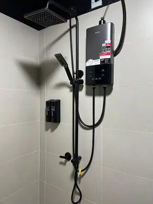 a shower in a bathroom with a shower at SAMSARA Studio Apartment at Kompleks Mutiara GM in Gua Musang