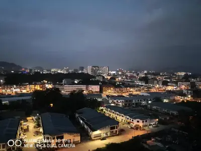 a view of a city at night at kakao homestay ipoh town 2parking 3room 10pax wifi in Ipoh
