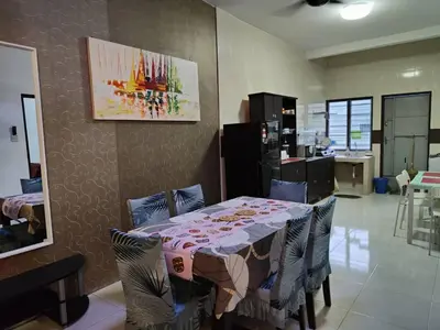 a dining room with a table and some chairs at YMT Tambun The Lost World Hideaway in Ipoh
