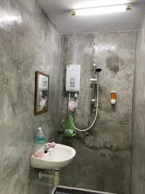 a bathroom with a sink and a shower at SmileHome at Cameron Brinchang - KEA FARM in Brinchang