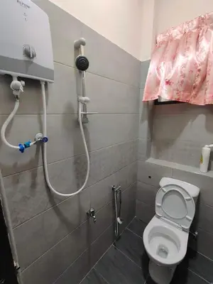 a small bathroom with a shower with a toilet at CLP perai homestay near Sri Muniswarar Temple 2 in Perai